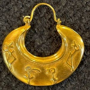 Gold toned earrings with small hieroglyphs. Never worn. EUC